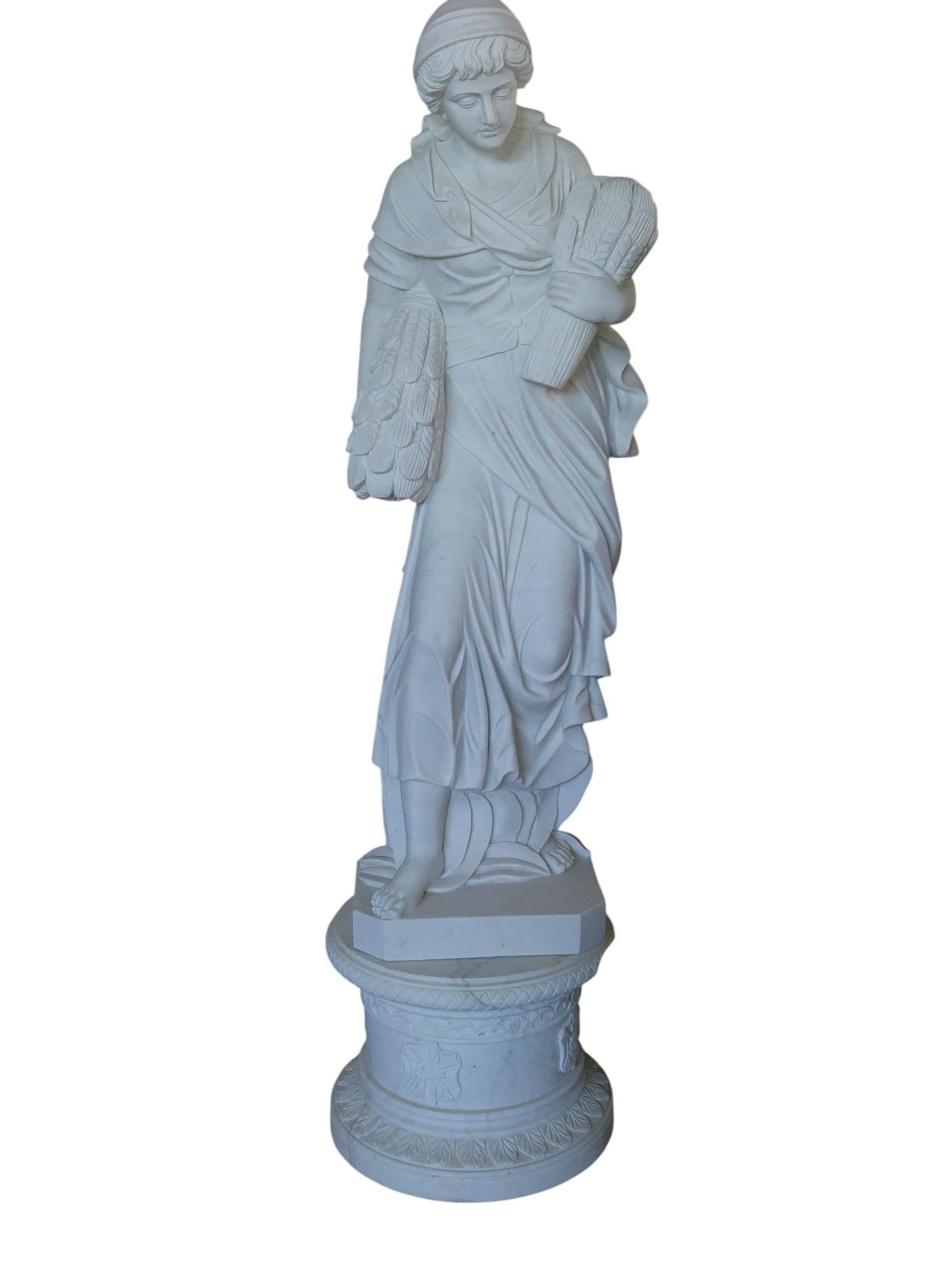 Four Seasons Italian Carrara marble statues. 
Classically draped female figures in their distinguishing symbols. 
Autumn, winter, spring and summer.
True Italian carving from the Carrara region
Each figure:
Total height including base 80