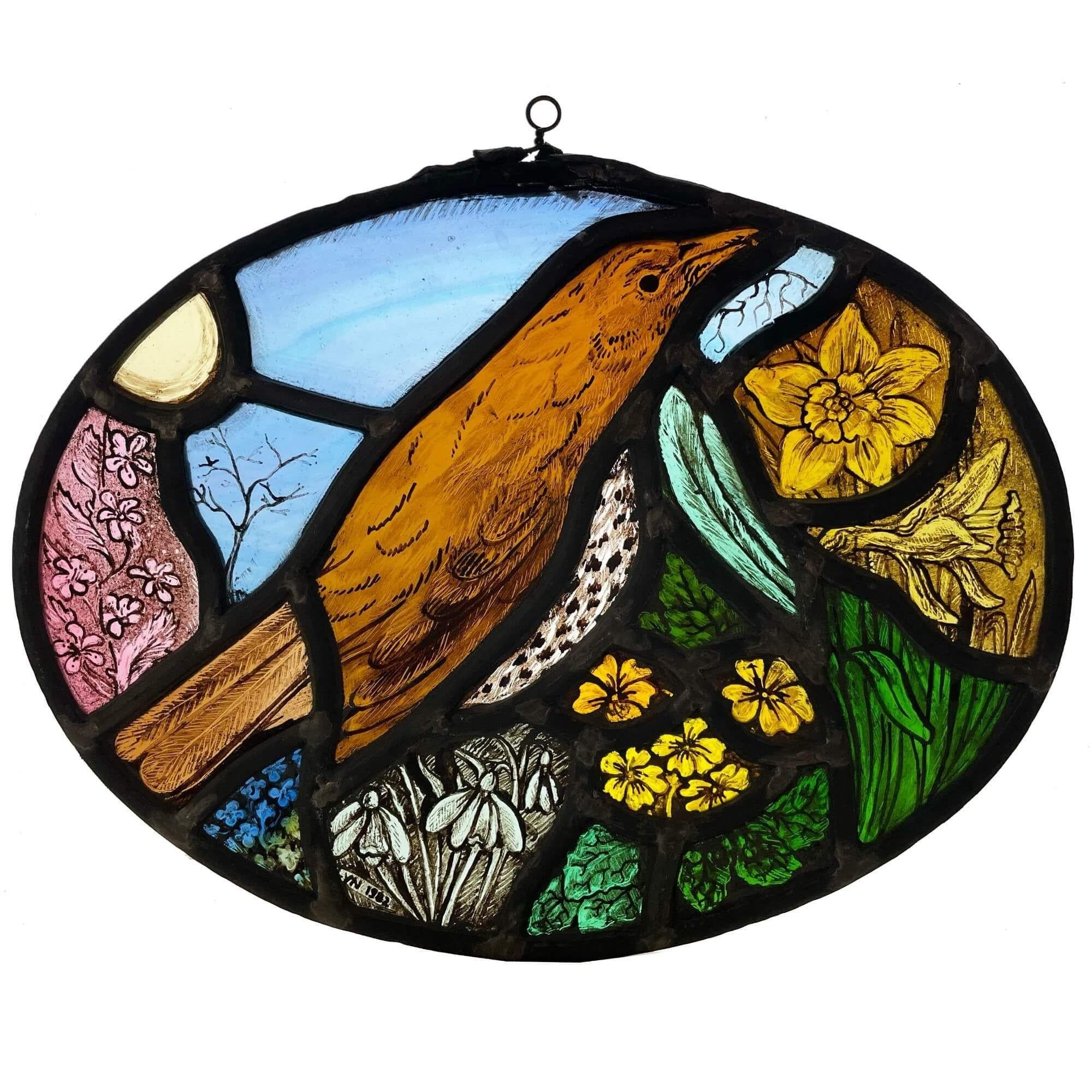 This picturesque set of 4 oval stained glass window hangings by British artist Lyn Claydon depict scenes of the four seasons. Dating from the late 20th century, they are a beautiful set, detailing British wildlife and animals including birds, a