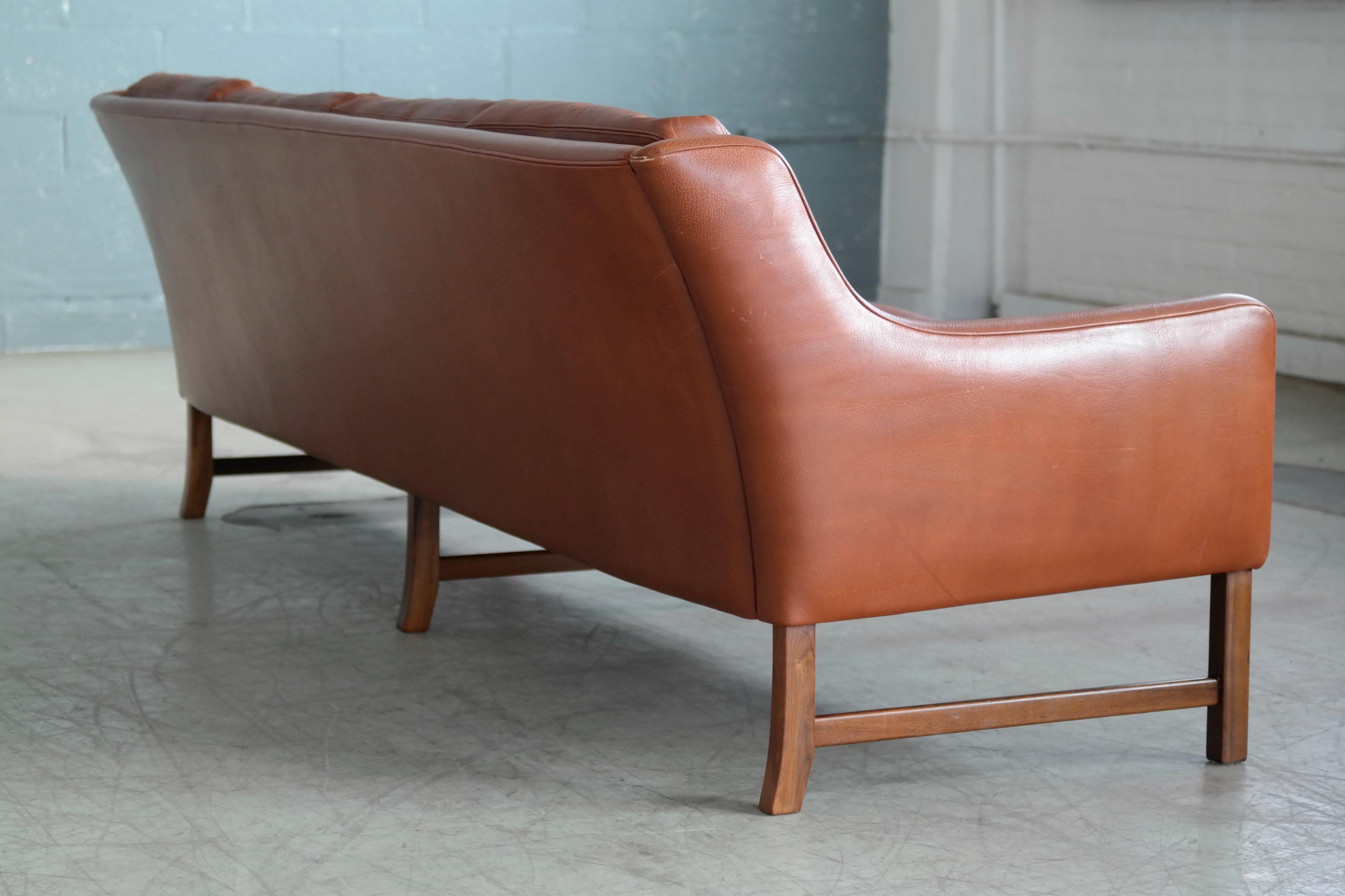 Mid-Century Modern Four-Seat Sofa in Cognac Leather and Rosewood by Fredrik Kayser for Vatne Norway