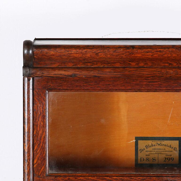 Four section quarter-sawn oak barristers’ bookcase by Globe Wernicke. Unusually-narrow width at 25.5?. C. 1910.
