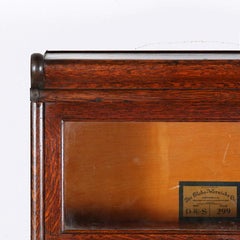 Four Section Oak Barristers Bookcase by ‘Globe Wernicke’