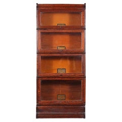 Four Section Oak Barristers Bookcase by ‘Globe Wernicke’