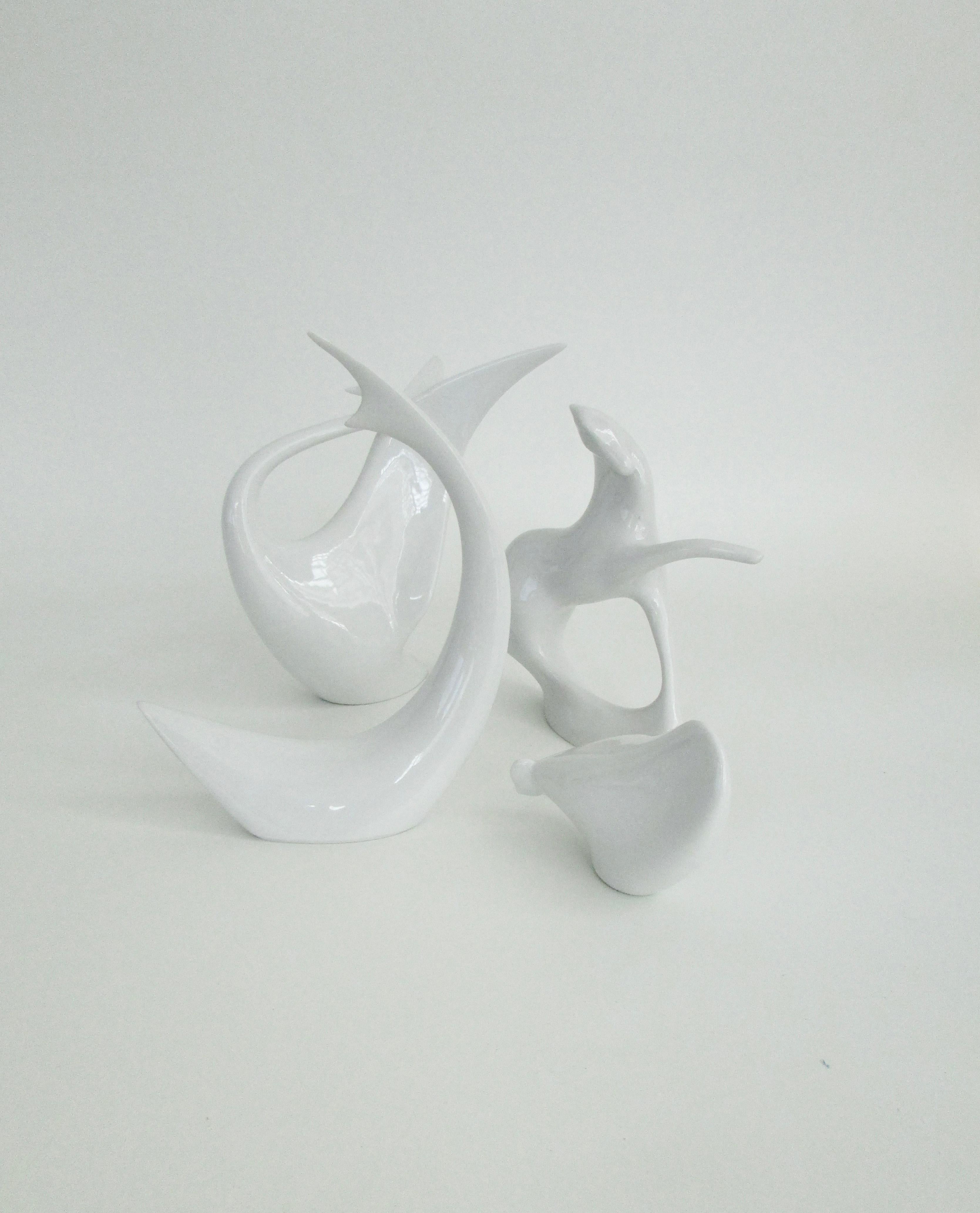 Please note these are priced separately  Royal Dux porcelain stylized sculptural figures . Shark at 7.5