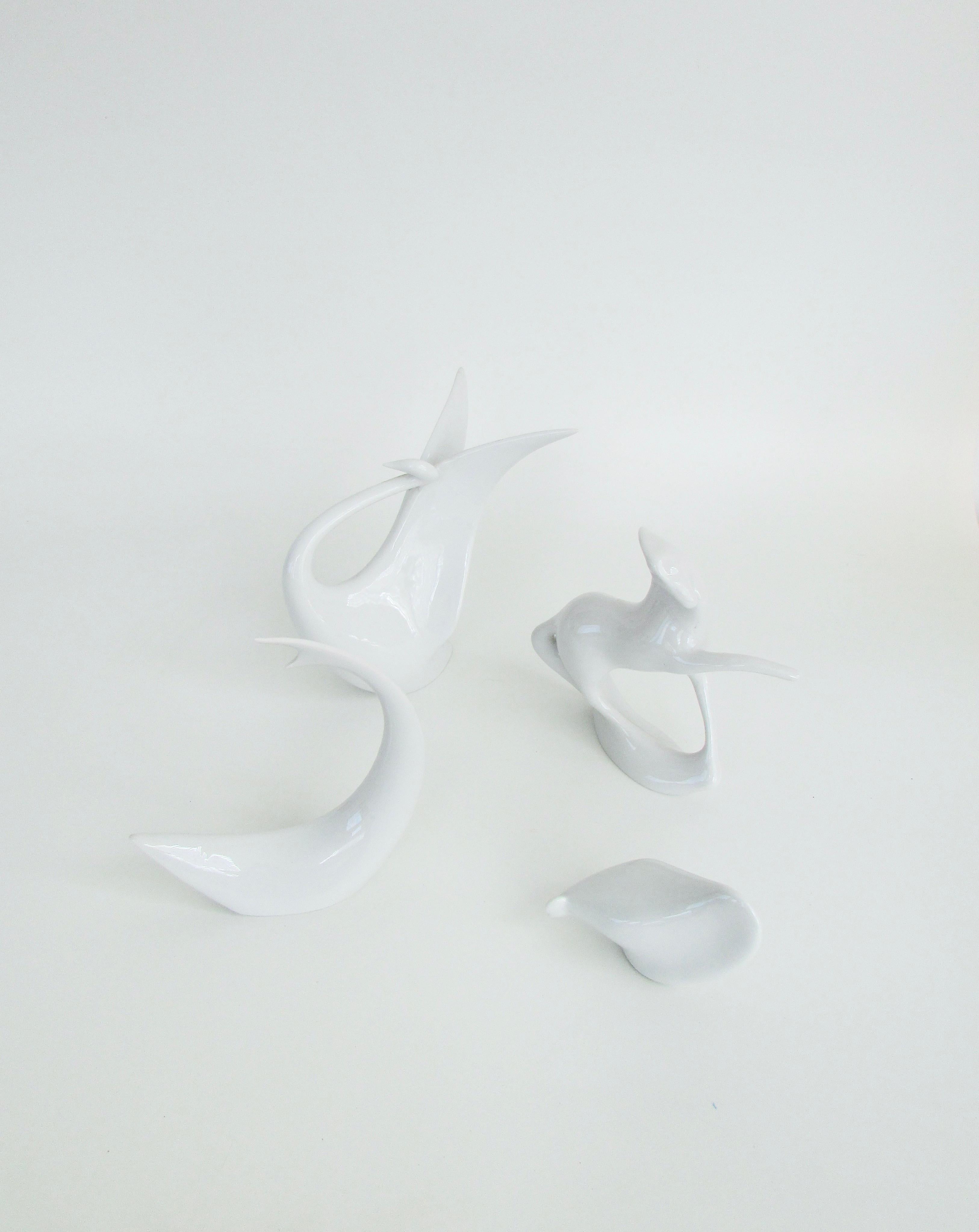 Fired Four Separate Jaroslav Jezek Stylized White Royal Dux Figures Swan Horse Shark For Sale