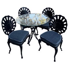 Quatre chaises de grotte coquillage et table coordonnée