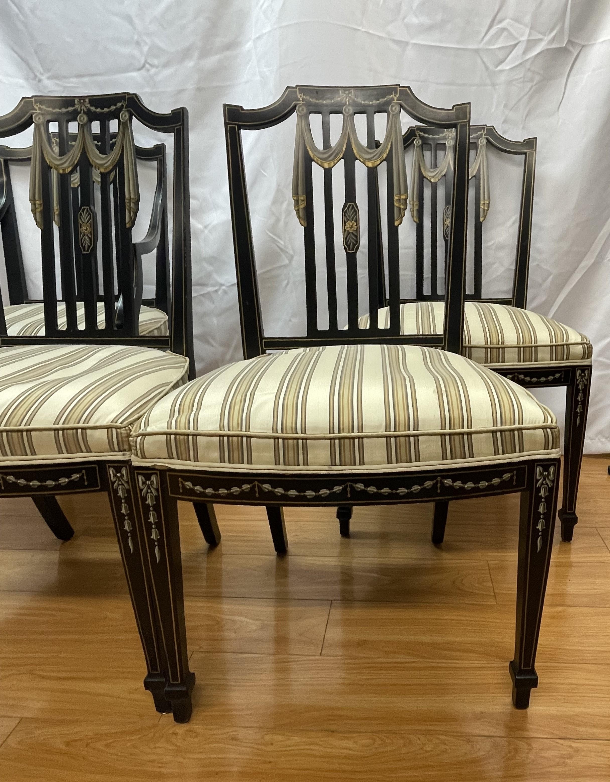 Four Sheraton chairs

Three side one arm handpainted ribbon decoration

Mid 20th century

22 x 18 x 36