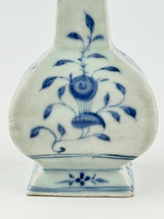 Four-Sided Blue and White Vase with Floral Scrolls