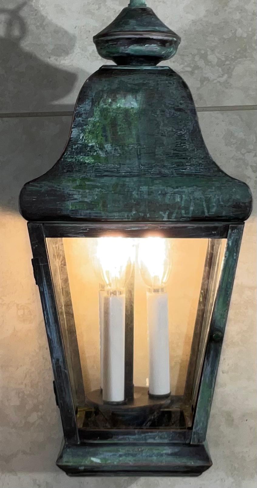 Quality handmade of solid brass lantern with three 60 watt lights.
Electrified and ready to light. Beautiful oxidization patina.
Made in the US.
Could be used in wet location.