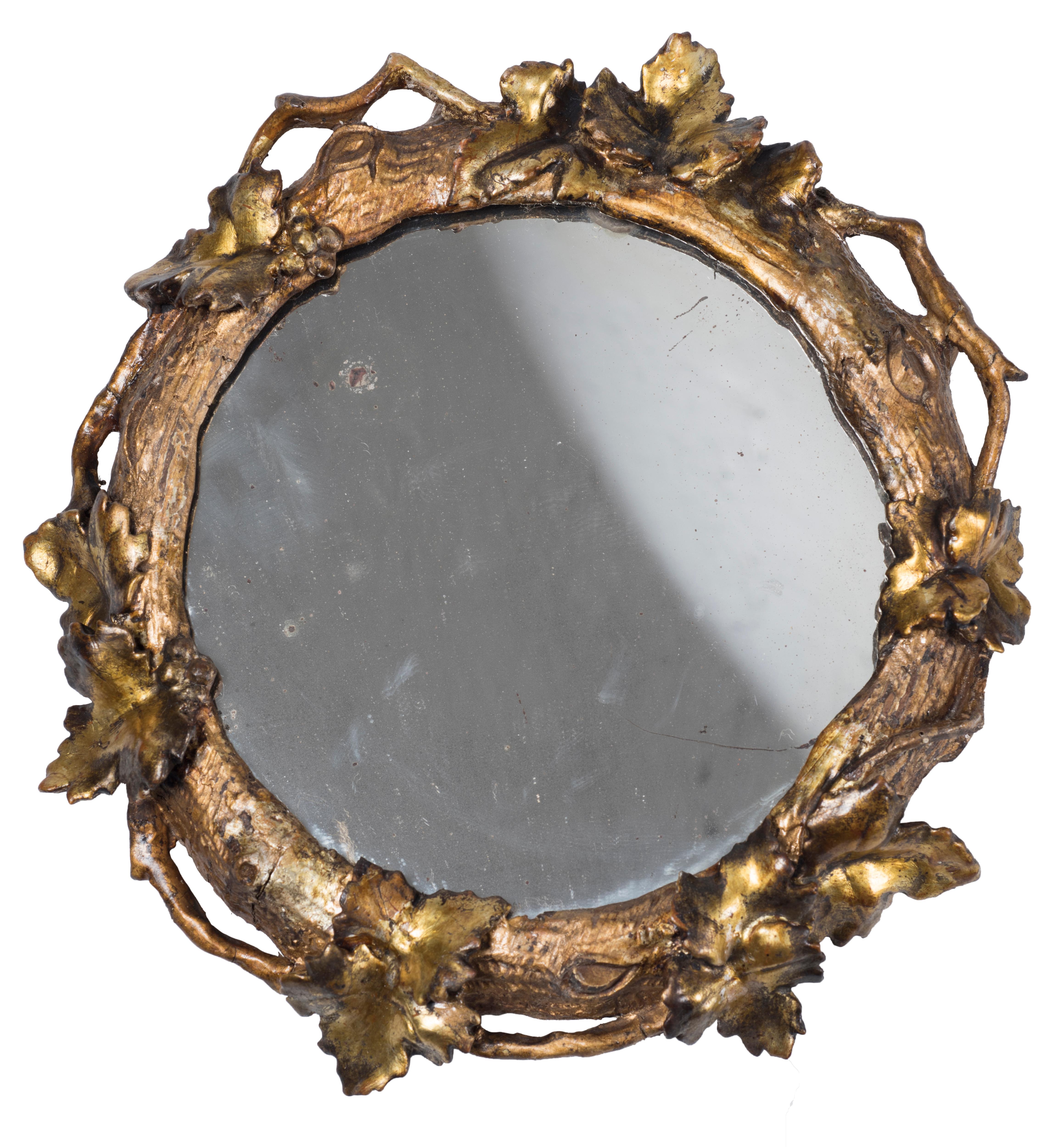 Four small circular wall mirrors, end of 18th century.
Gilded wood finely decorated with grapevine shoots.
Good conditions.

This artwork is shipped from Italy. Under existing legislation, any artwork in Italy created over 70 years ago by an