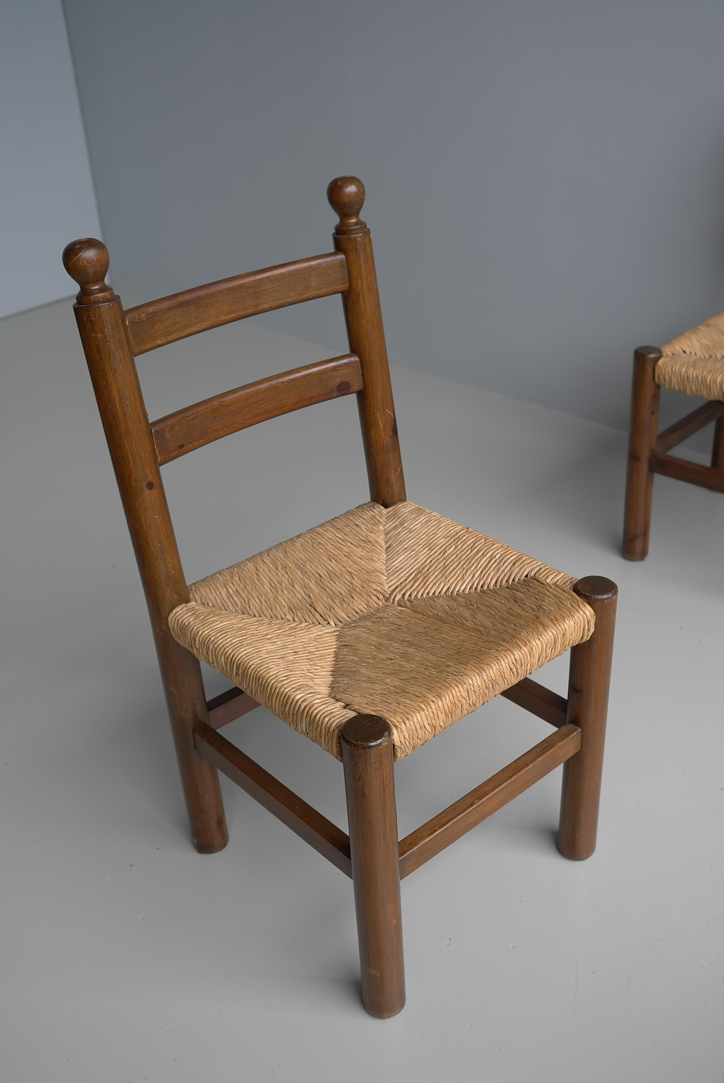 French Four Solid Pine dining room chairs wit Rush seats in Style of Charles Dudouyt For Sale