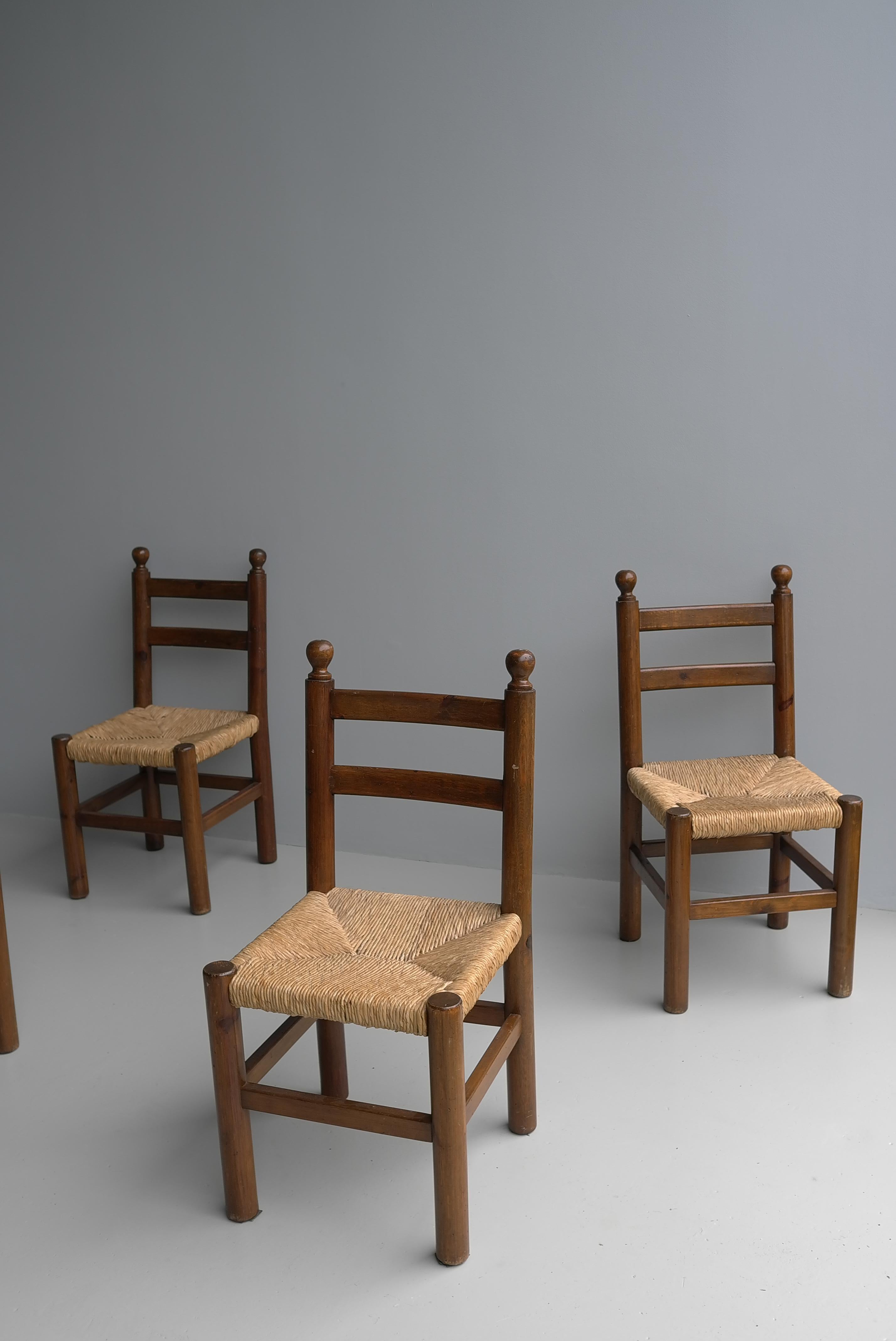 Mid-20th Century Four Solid Pine dining room chairs wit Rush seats in Style of Charles Dudouyt For Sale