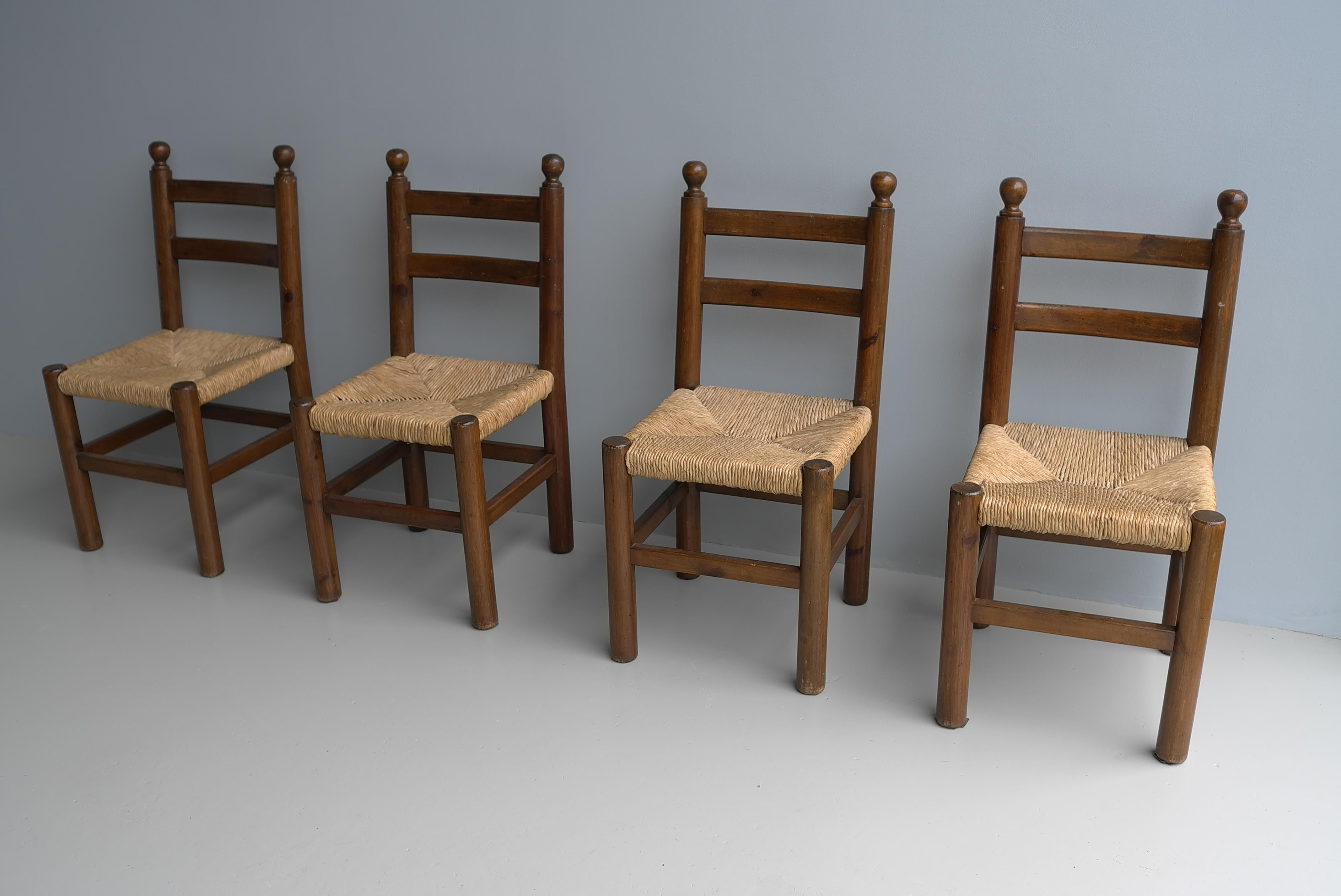 Four Solid Pine dining room chairs wit Rush seats in Style of Charles Dudouyt For Sale 1