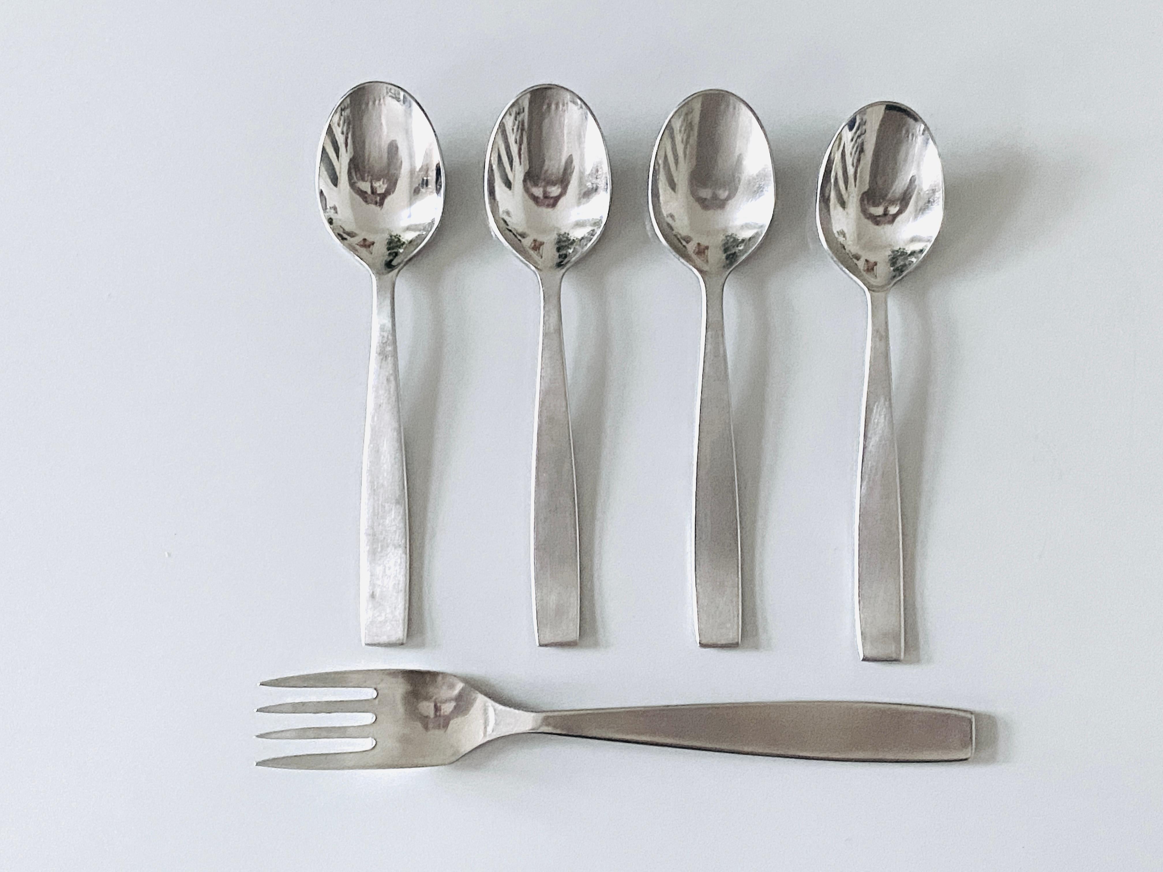 A fork and 4 spoons from Austria, model 2050, designed by Helmut Alder, executed by Amboss Austria in the 1950s. High-quality flatware, made of brushed and polished stainless steel. In good condition with marginal signs of wear. 