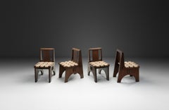 Cuatro sillas de roble teñido a la manera de Charles Dudouyt, Francia Siglo XX