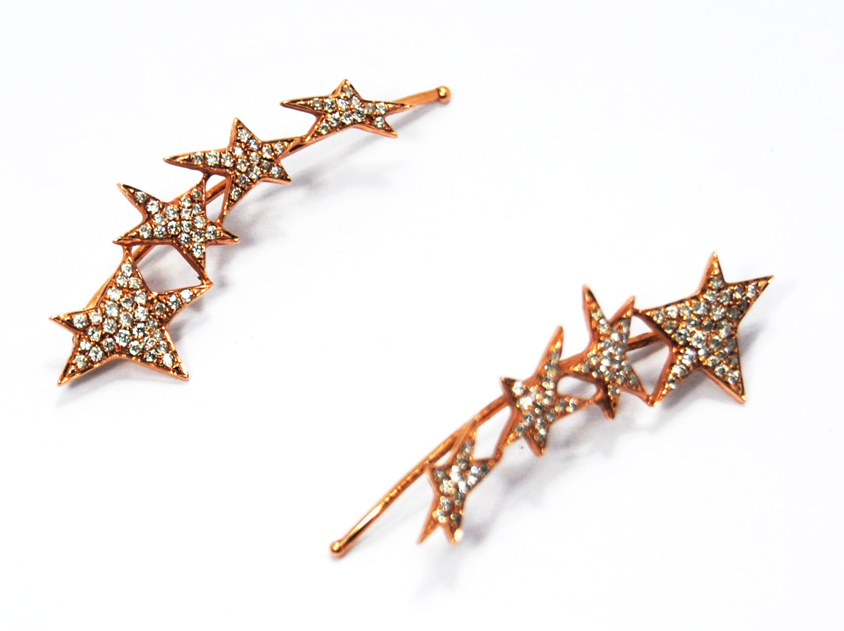 Stars Cuff Diamonds Earrings in rose gold 
The earrings measure 35mm/ 1,37 inch in length and have a gross weight of 3.5gr
Diamonds 150 pieces totaling 0.60ct 

PRADERA is a  second generation of a family run business jewelers of reference in Spain,