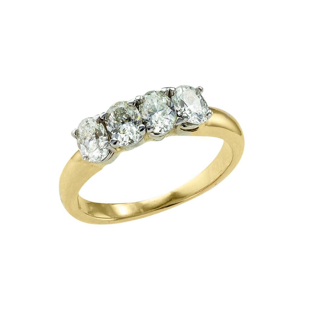 Vintage four-stone oval diamond and yellow gold ring circa 1960.  *

ABOUT THIS ITEM:  #A8080. Scroll down for specifications.  Four oval diamonds consecutively set with the long ends vertical to the fingernail, all are well matched for color and