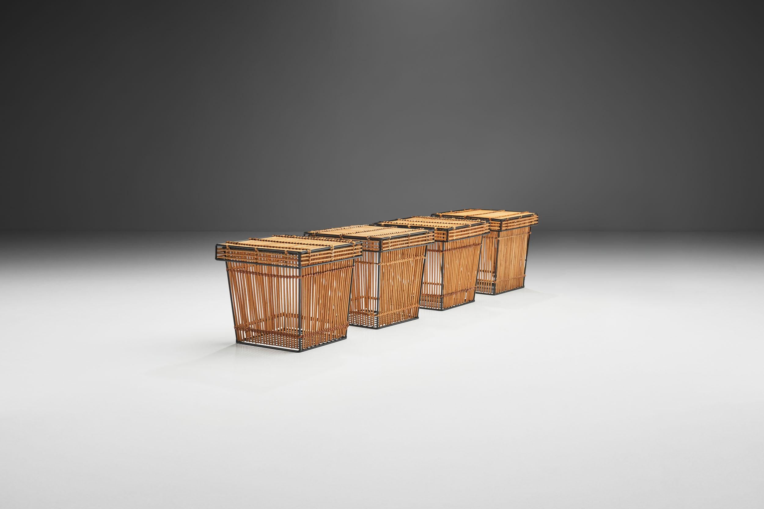 These rattan and steel baskets are attributed to Dutch designer, Dirk van Sliedregt, and were manufactured by Rohé Noordwolde in the 1960s.

Each Rohé basket has a metal structure covered in wicker. The organic material is carefully woven around