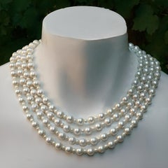 Four Strand Faux Pearls Necklace with Silver Plated Pavé Panther Clasp