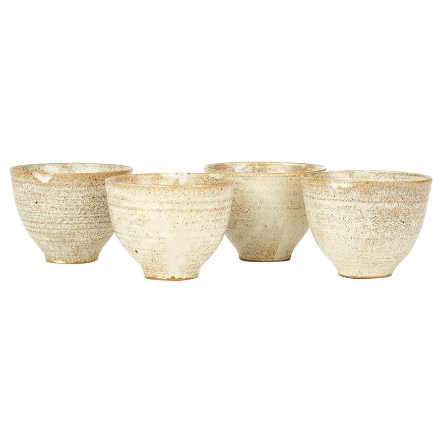 Four Studio Pottery Oatmeal Glazed Bowls, 20th Century