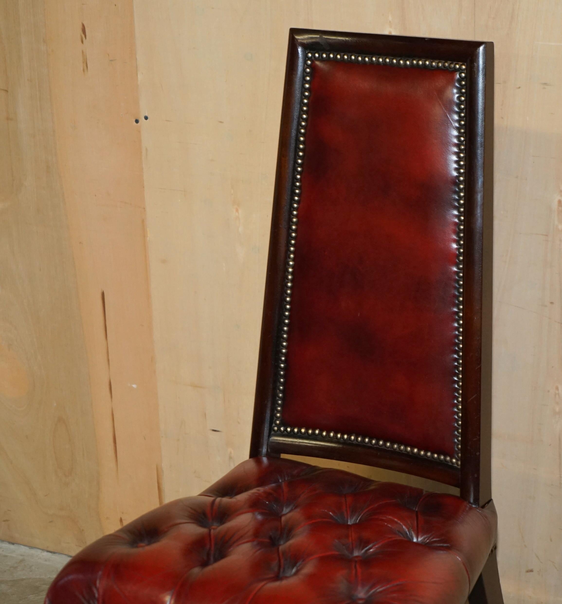 English FOUR STUNNING VINTAGE OXBLOOD LEATHER HiGH BACK CHESTERFIELD DINING CHAIRS For Sale
