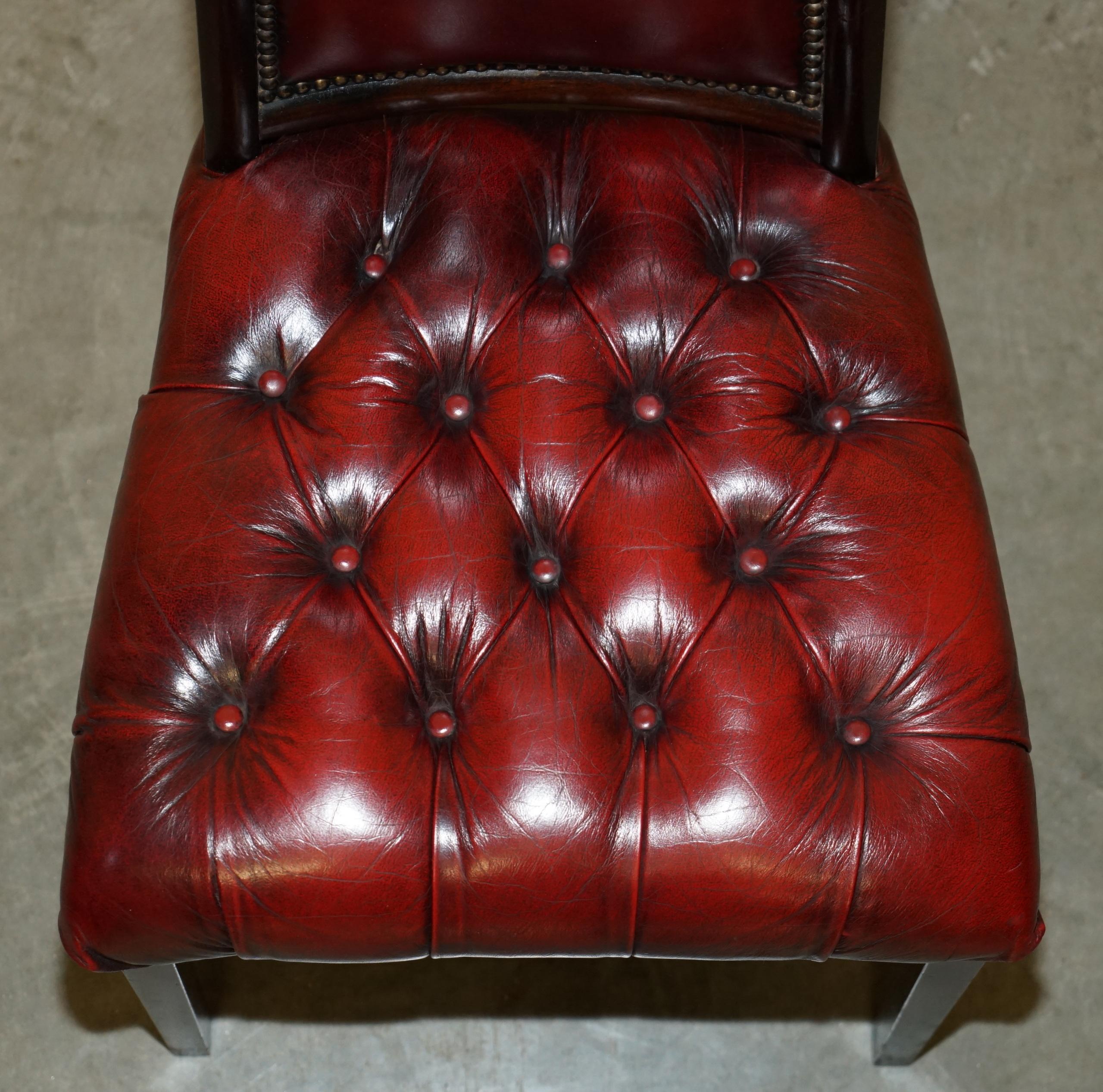 20th Century FOUR STUNNING VINTAGE OXBLOOD LEATHER HiGH BACK CHESTERFIELD DINING CHAIRS For Sale