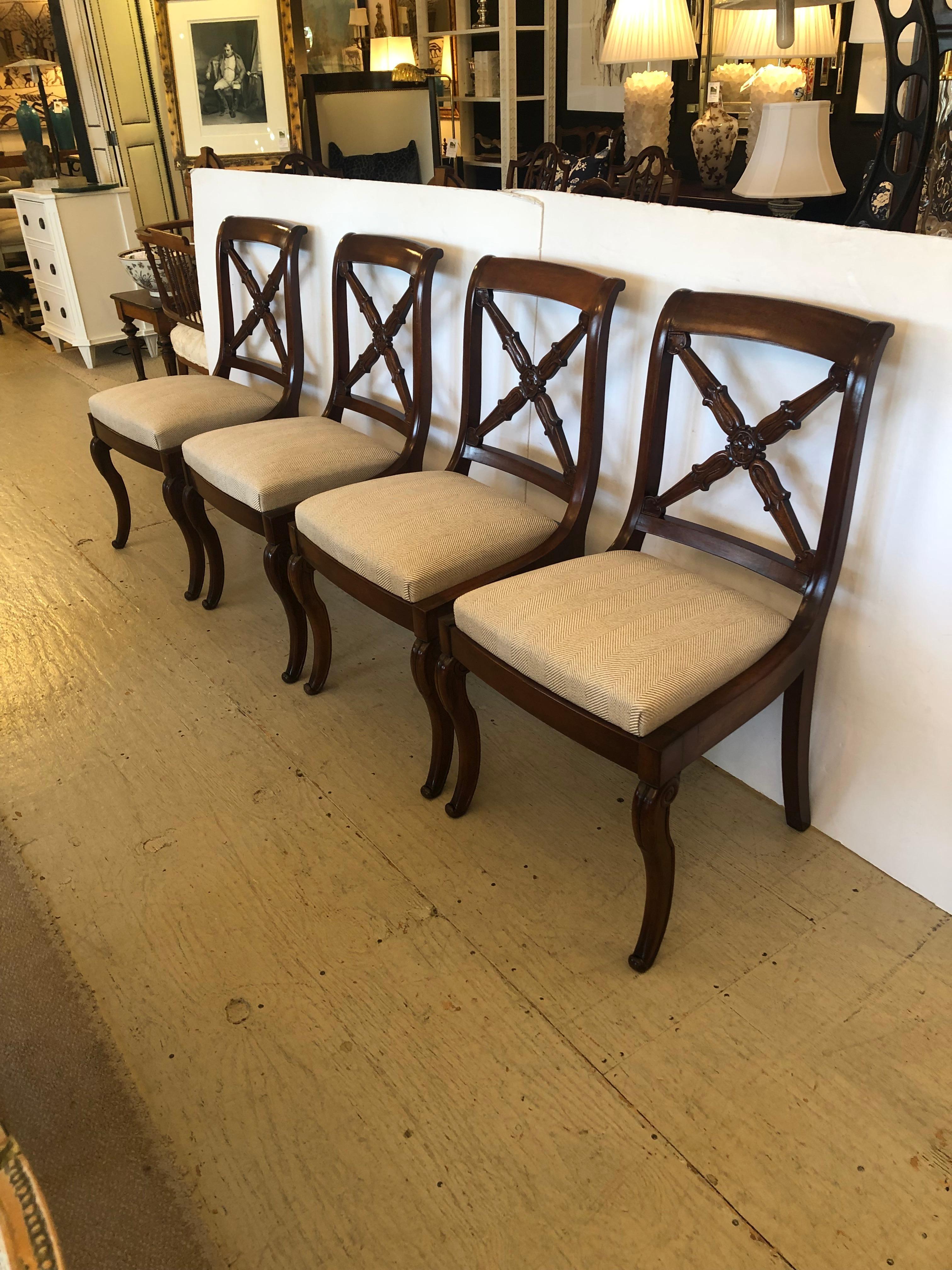 Four fine quality antique mahogany side chairs having carved wood 