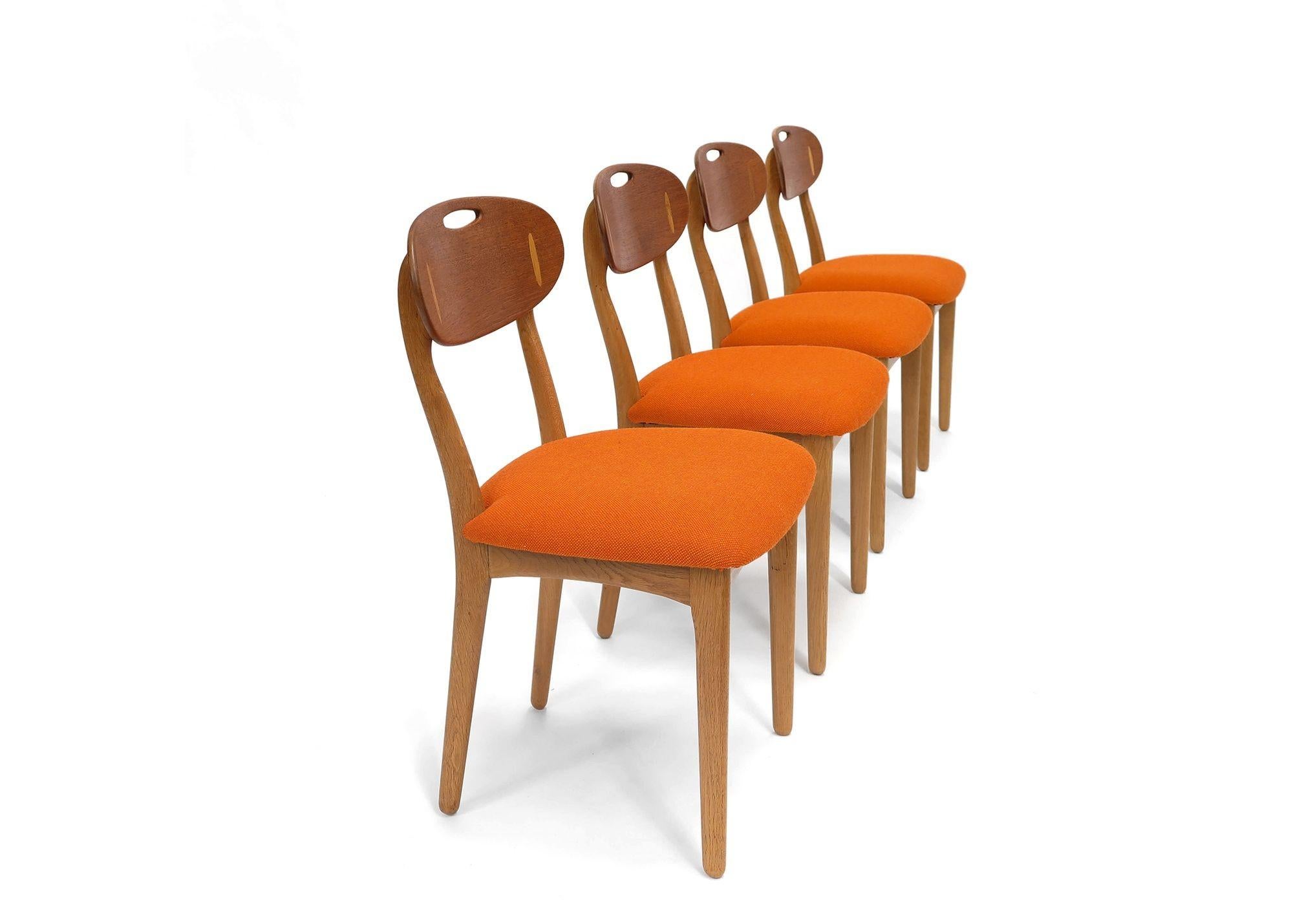 Set of 4 midcentury Danish dining chairs designed by Svend A. Madsen for K Knudsen & Son, 1960, Denmark. The chairs frames are crafted of solid white oak with sculpted teak backrest and exposed oak joinery. The chairs have been fully restored and