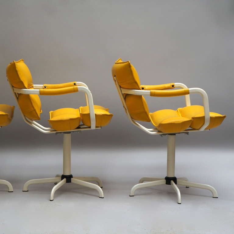 Hollywood Regency Four Swivel Armchairs in Yellow Leather and White Base For Sale