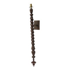 Four Tall Turned Oak Sconces