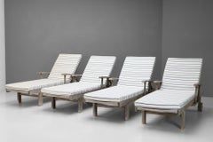 Four Teak Loungers