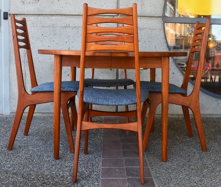 Four Teak Tall BowTie Ladder Back Dining Chairs Attributed to Kai
