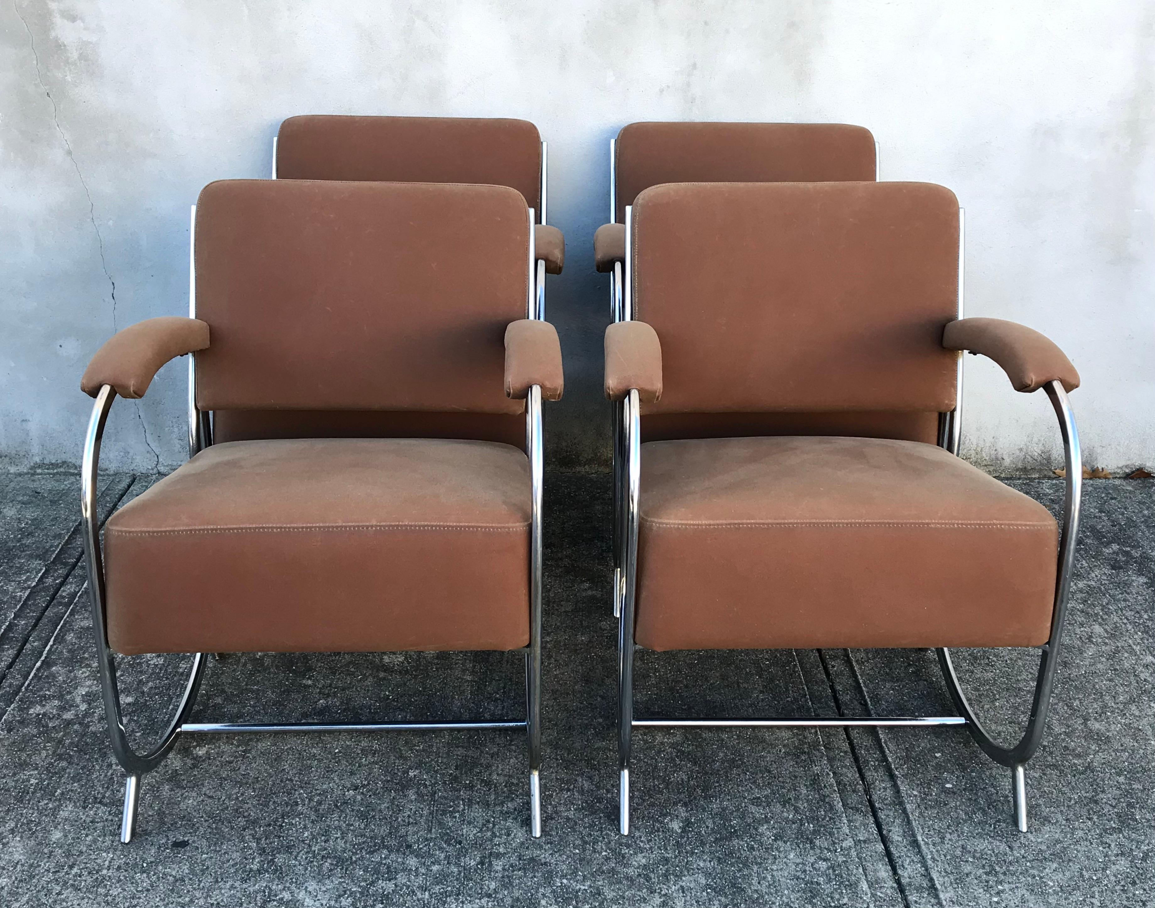 Fantastic and very rare set of 4 1930s club chairs by Theo A. Kochs Chicago in the style of KEM Weber. Aged patina chromed frames, reupholstered in nutmeg colored waxed canvas. Please note that waxed canvas fabric will easily mark or craze, which is