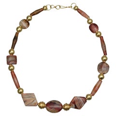 Four Thousand Year Old Agate Beads with Collared Spherical 20k Gold Beads
