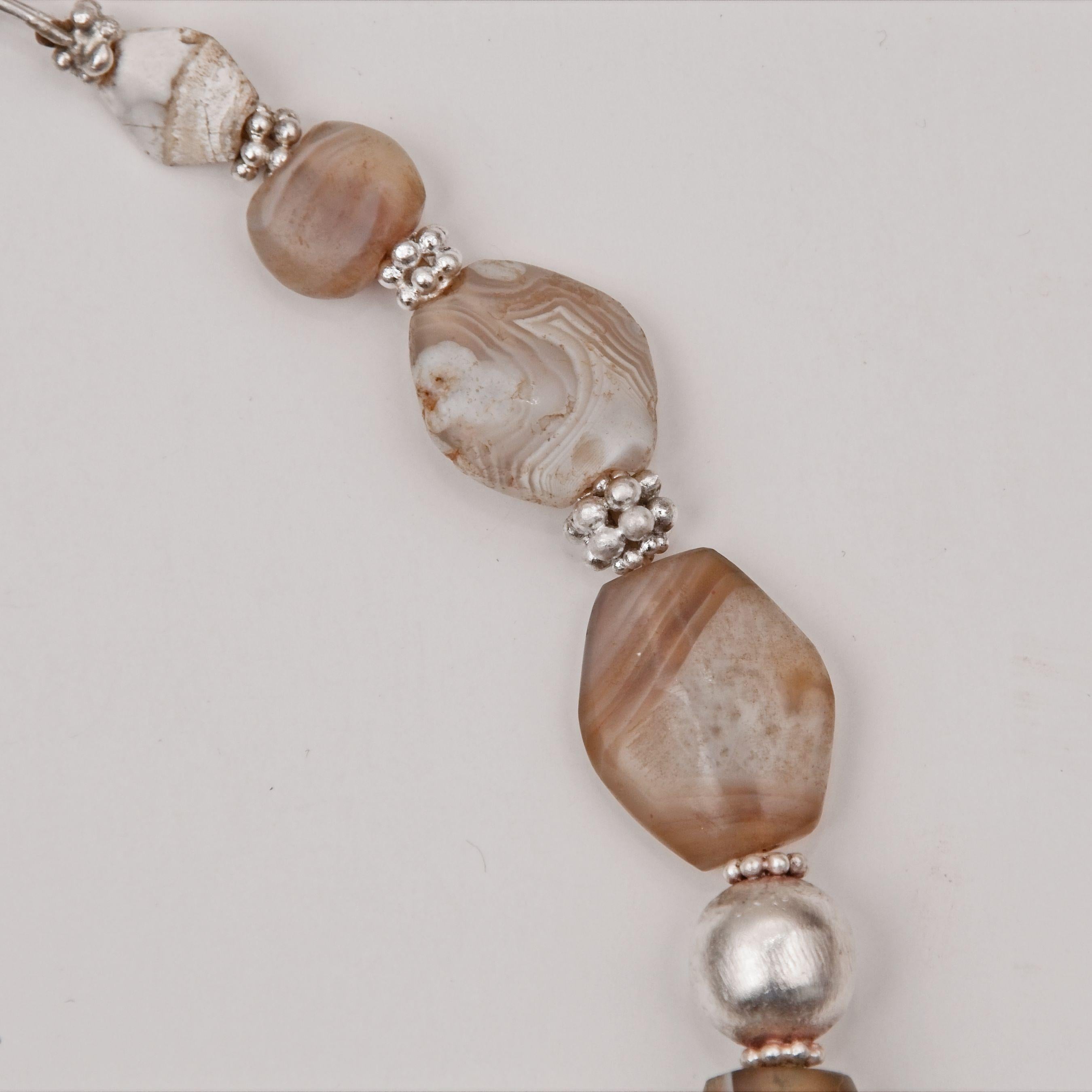 Artist Four Thousand Year Old Agate Beads with Collared Spherical Silver Spacer Beads For Sale