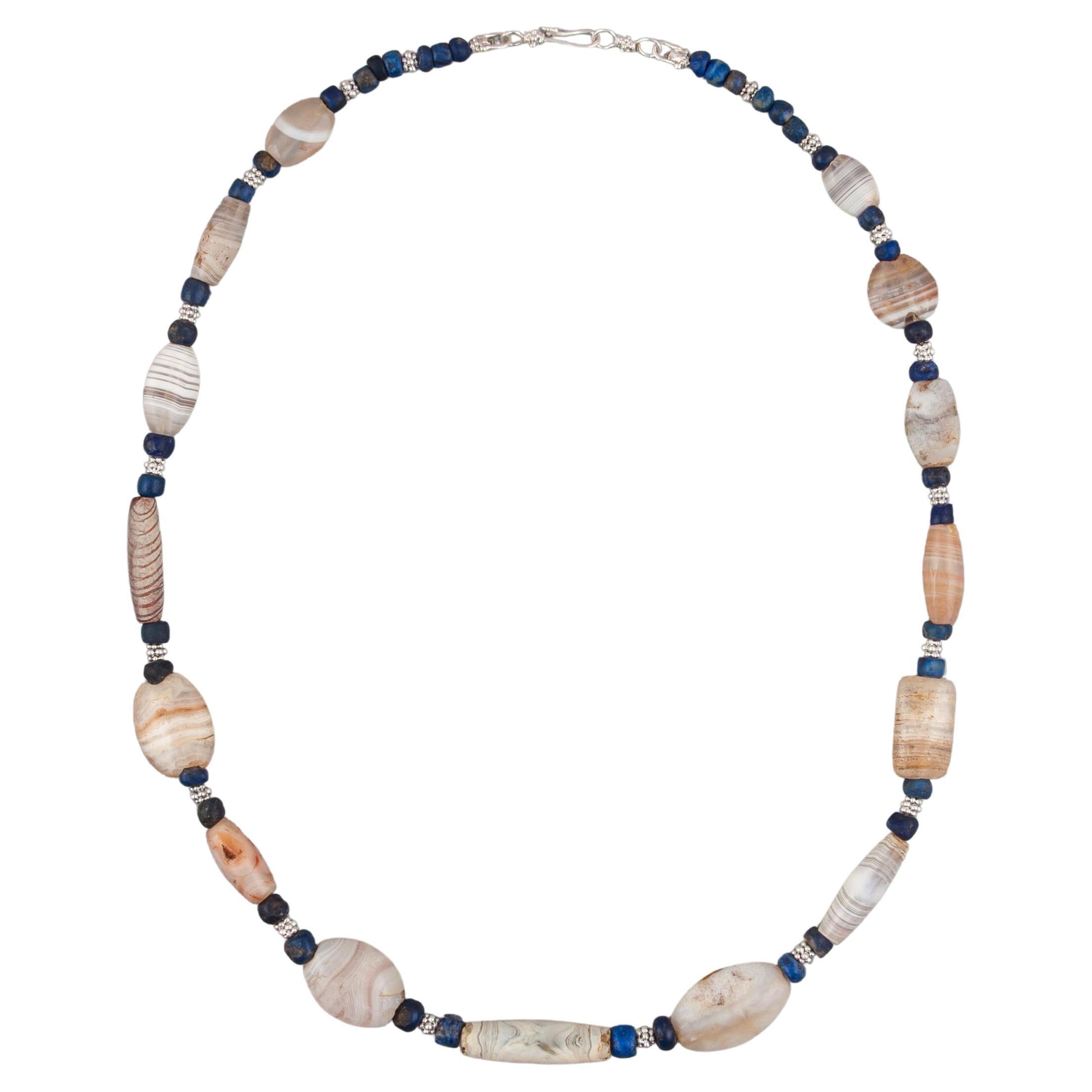 Bronze Age Agate Beads with Lapis Lazuli and Granulated Silver Spacers For Sale