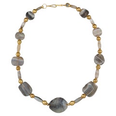 Four Thousand Year Old Tabular and Barrel Agate Beads with Round Gold Beads