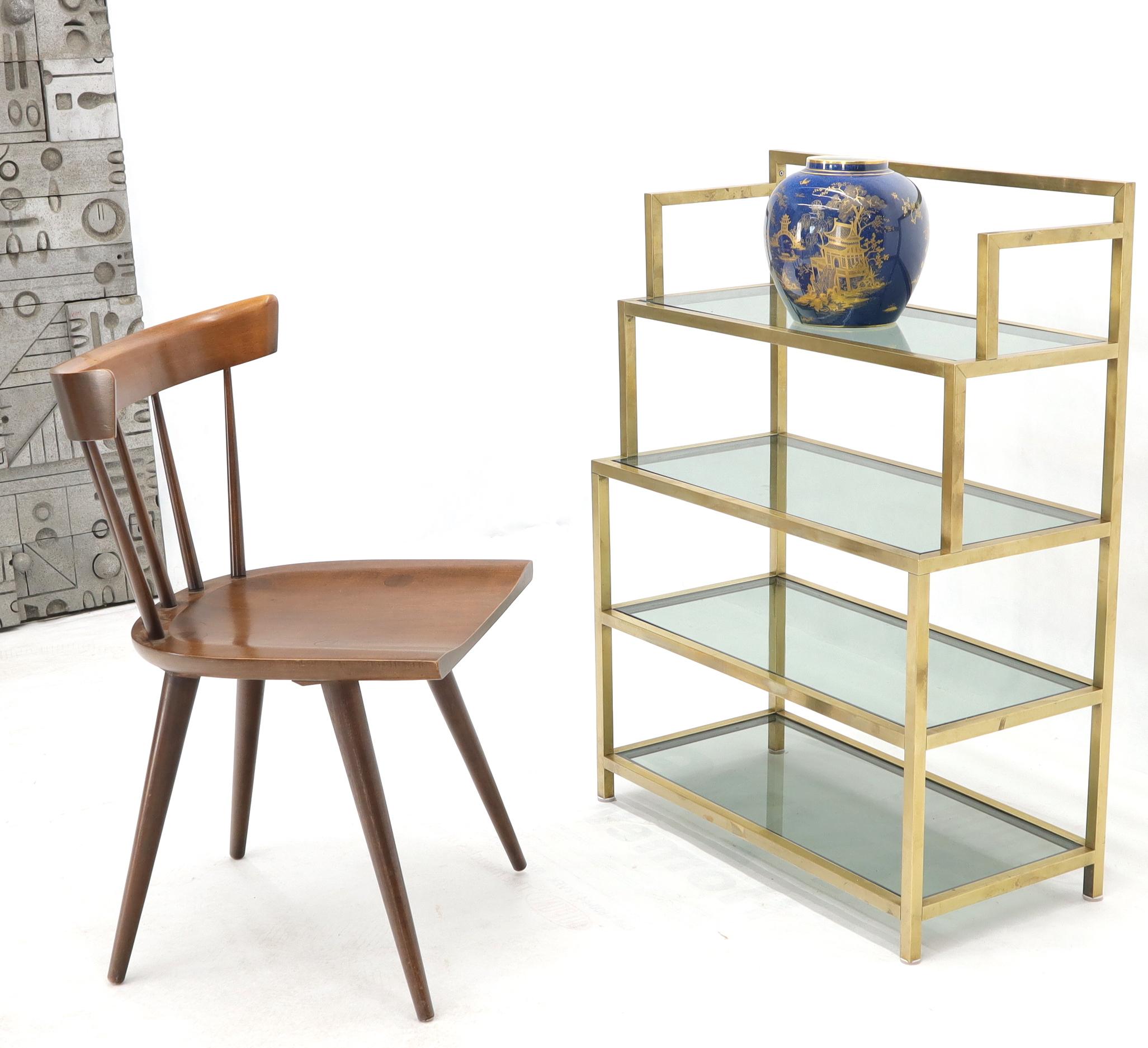 Mid-Century Modern solid brass square profile 4-tier step étagère with smoked glass shelves storage display unit. Perfect Paul McCobb Calvin group decor match.