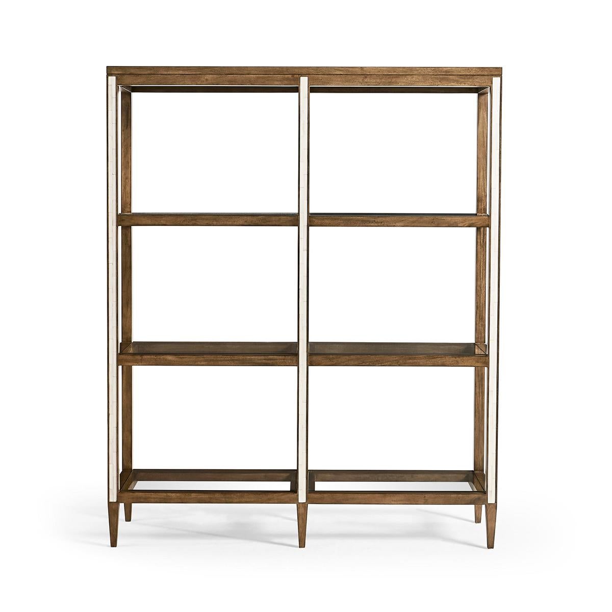 The front and back rails of this etagere feature a faux bone inlay that adds an intricate and tactile dimension to the piece. With three framed glass shelves, this etagere provides ample space for displaying your favorite items.

Whether placed in a
