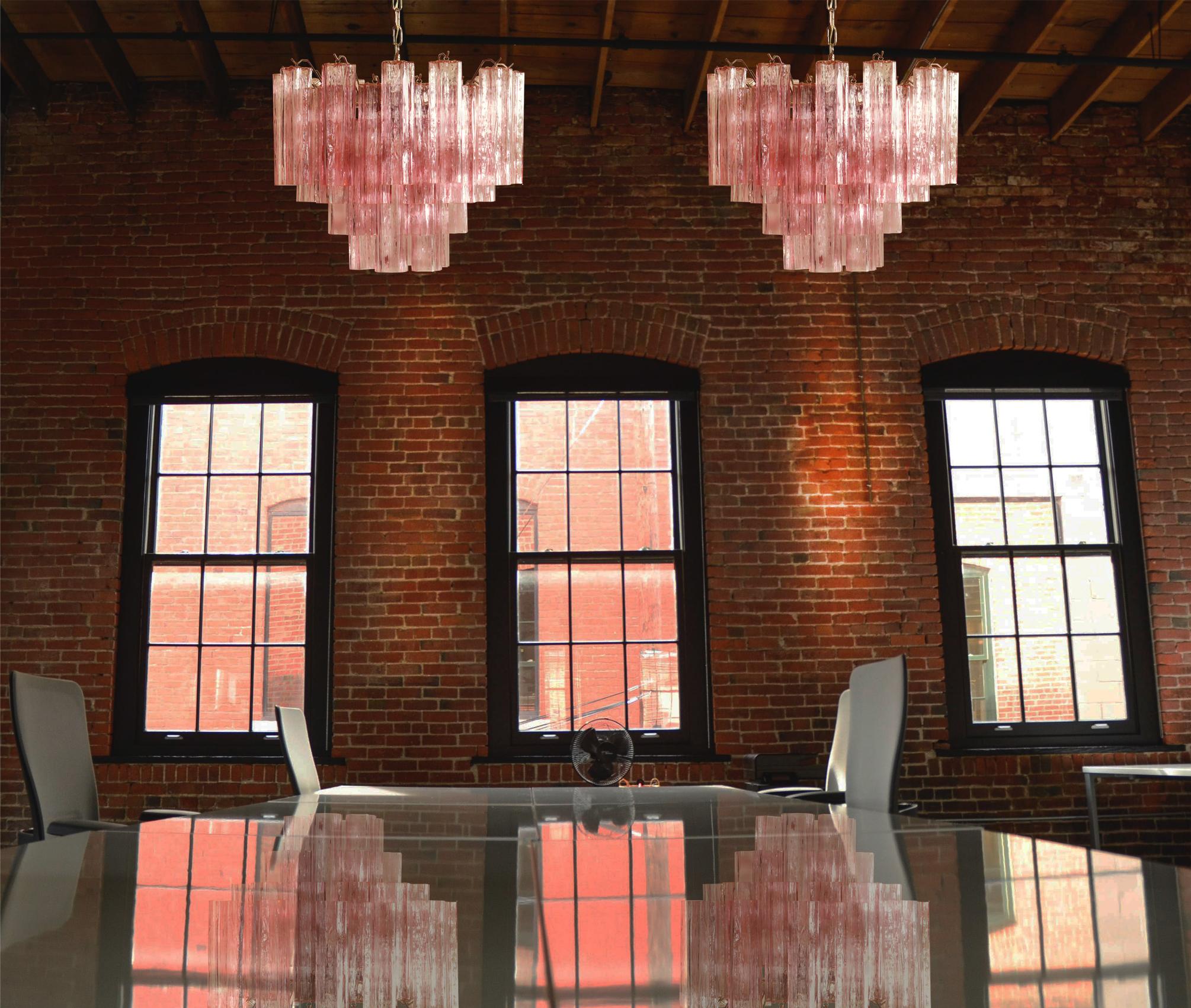 Four Italian vintage chandeliers in Murano glass and nickel-plated metal structure. The armor polished nickel supports 36 large pink glass tubes in a star shape.
Period: Late 20th century
Dimensions: 45.30 inches (115 cm) height with chain, 19.70