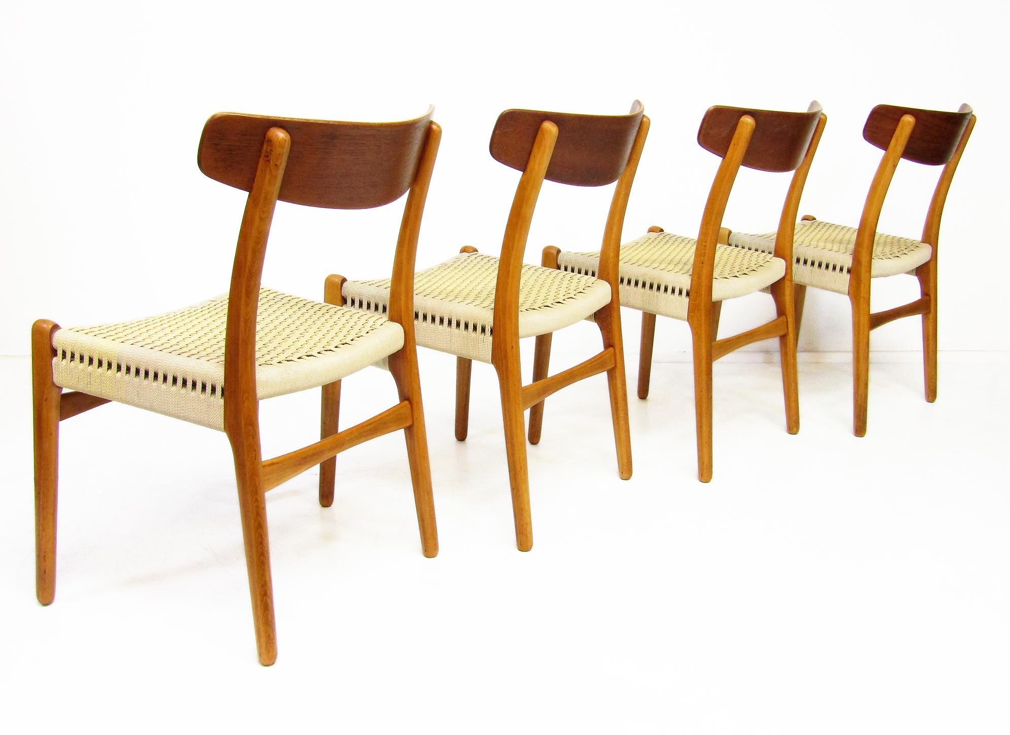Scandinavian Modern Four Vintage 1950s CH-23 Chairs by Hans Wegner for Carl Hansen in Teak & Oak For Sale