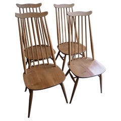 Four vintage 1970s Ercol Goldsmith chairs in Beechwood.