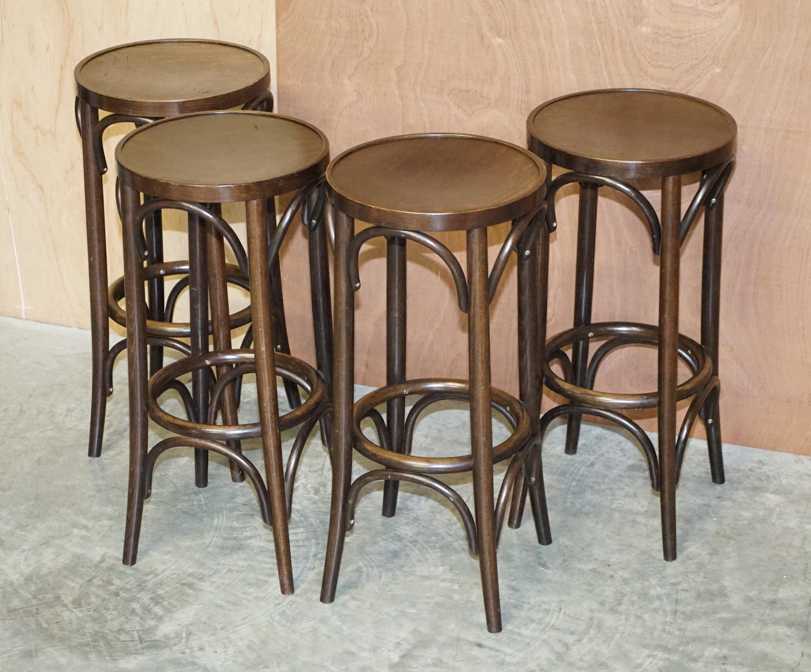 We are delighted to offer this lovely suite of four vintage Thonet bentwood with plywood seats bar stools

These stools are very utilitarian and extremely comfortable, the design is timeless and classic, they look sophisticated in any