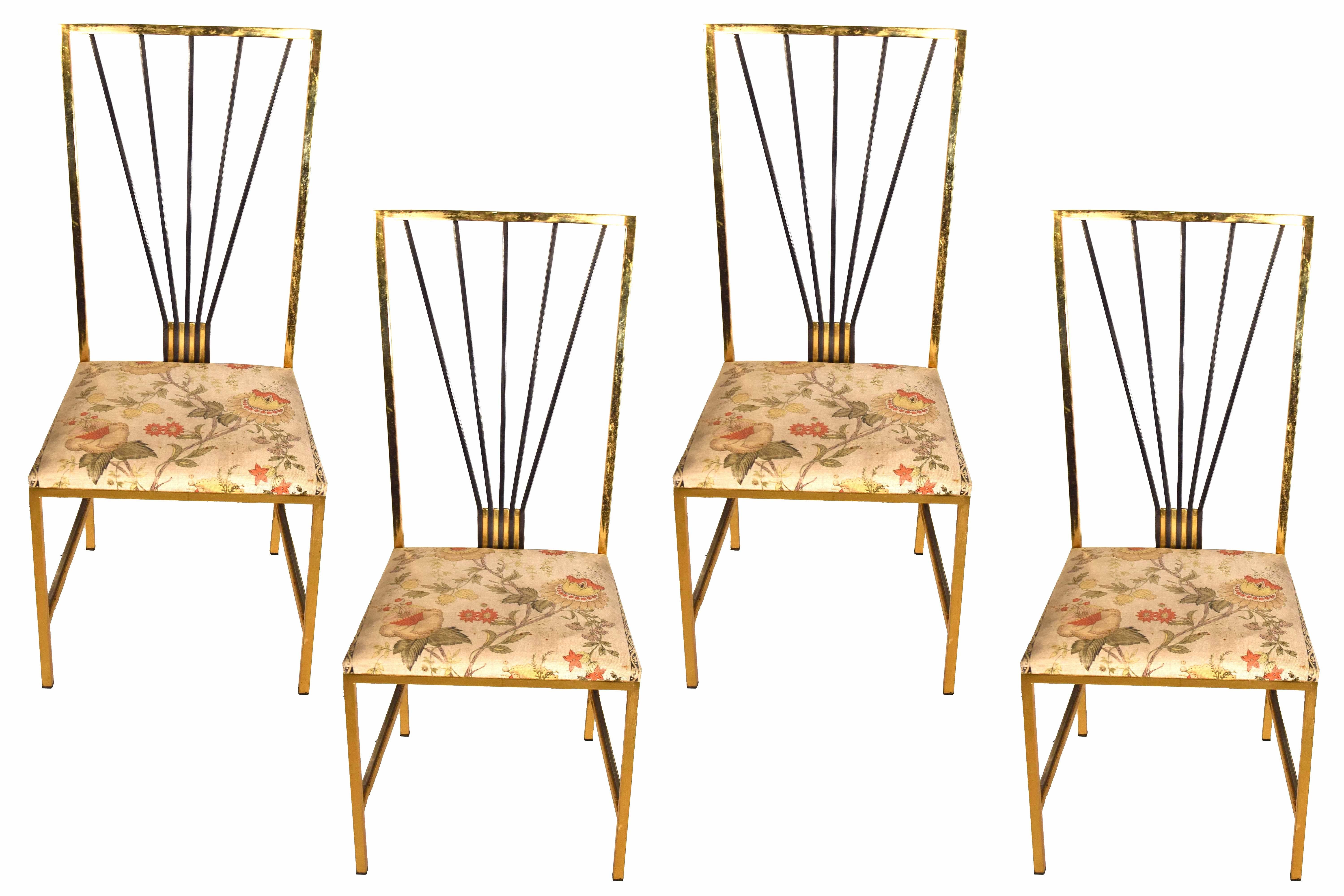 Set of four chairs is an original piece of design furniture attributed to Romeo Rega in Italy in the 1980s.

Made of golden metal, oxidized metal and padded fabric, with beautiful floral design on it.

Very good conditions.

This object is