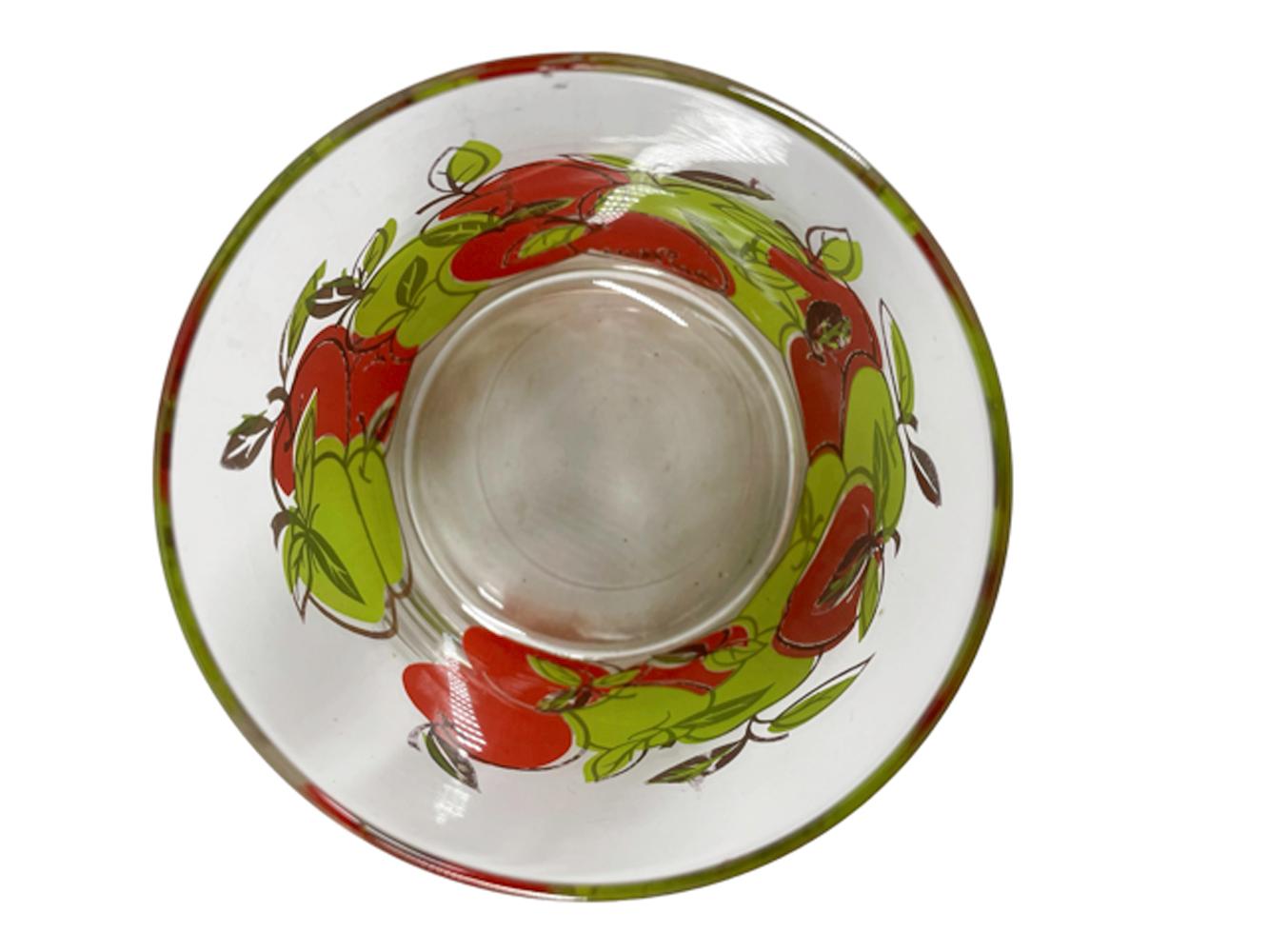 Set of 4 mid-century modern rocks glasses designed by Fred Press with red and green apples accented with 22 karat gold.