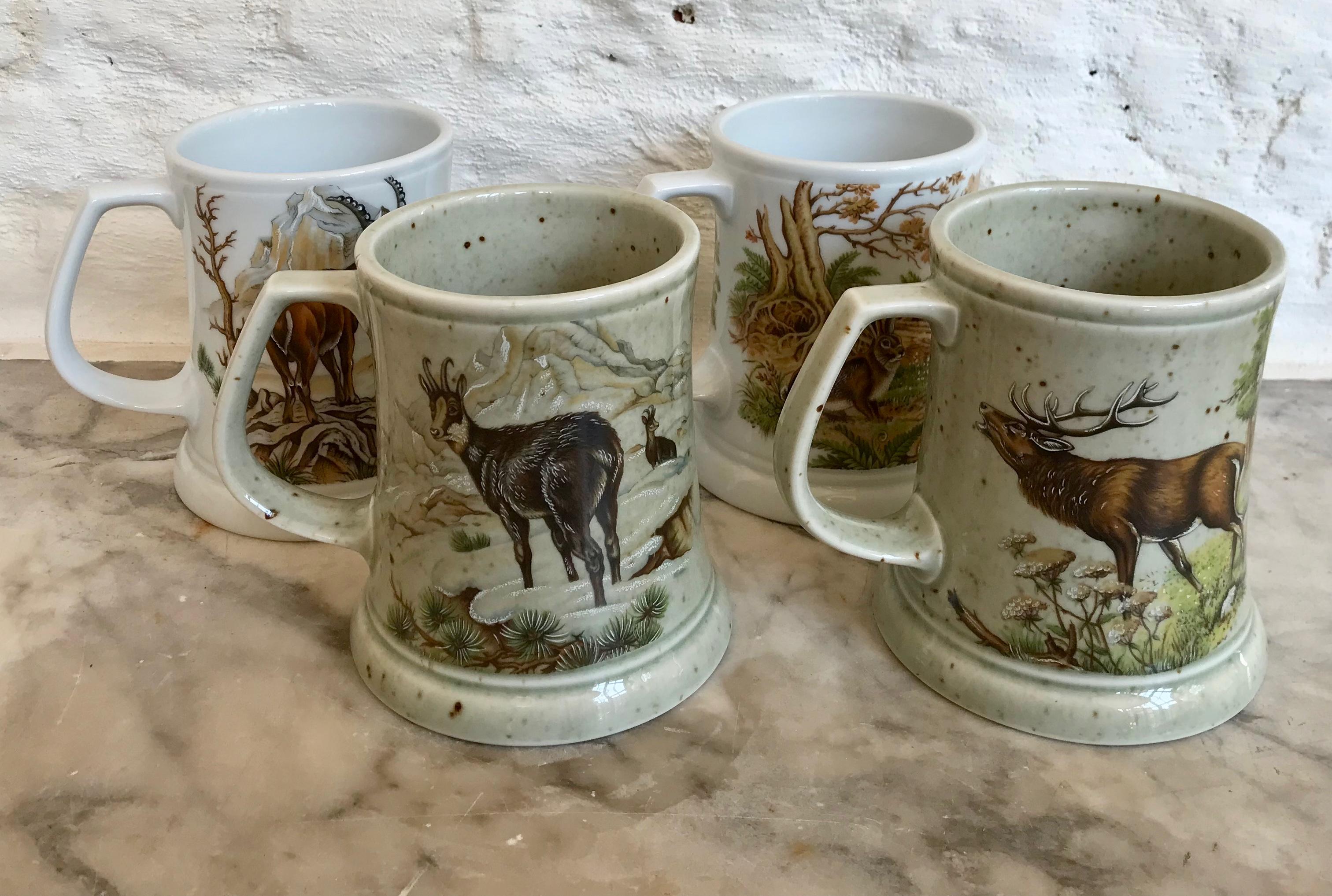 A set of four German hand painted mugs, circa 1970 marked 