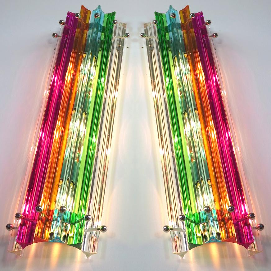Four vintage Murano wall sconces – multi-color triedri - column Mariangela model
Fantastic four of vintage Murano wall sconce made by 6 Murano crystal prism (triedri) for each applique in a chrome metal frame. The shape of this sconce is column.