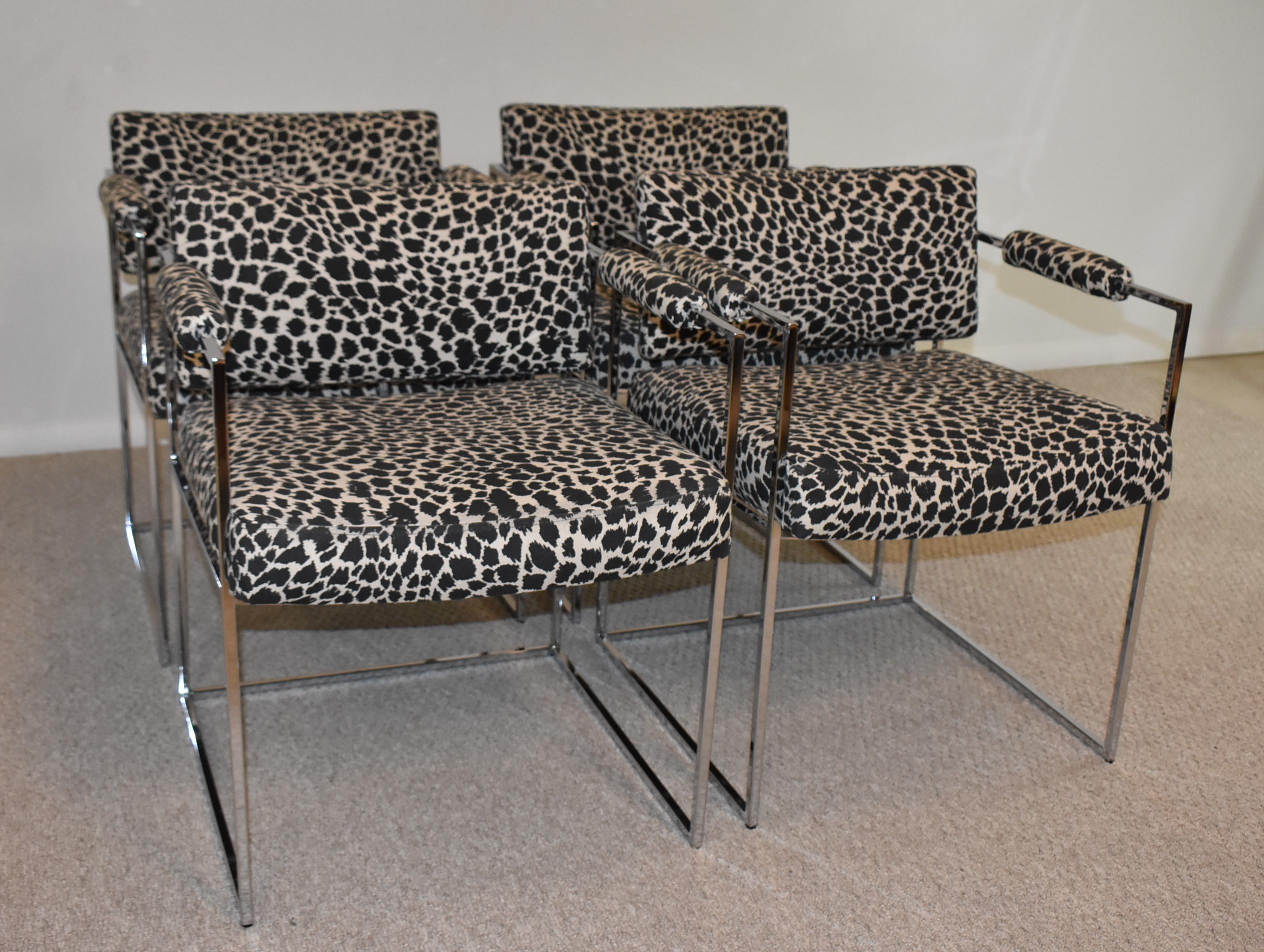 Four vintage Milo Baughman tubular chrome and fabric dining side chairs. Measures: 23