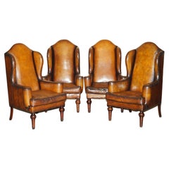 Four Vintage Oak Framed William Morris Cigar Brown Leather Wingback Armchairs