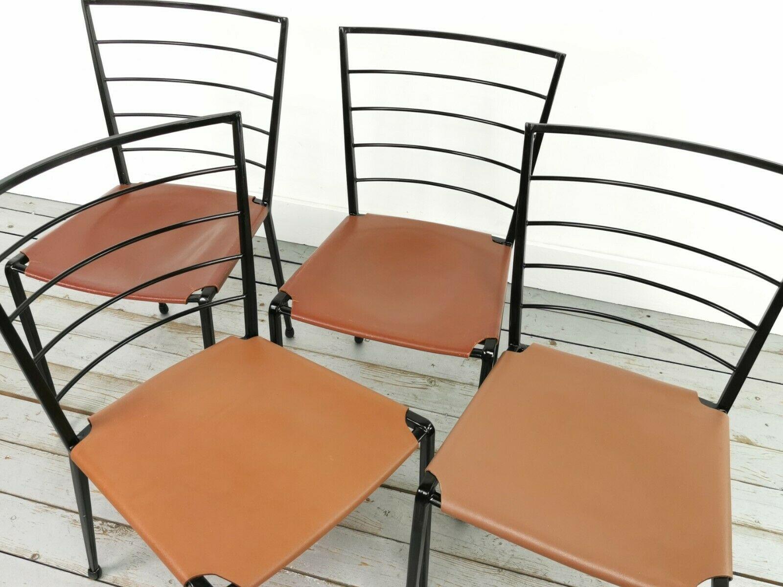 Ladderax dining chairs

Original scarcely seen set of four Ladderax dining chairs.

Robert Heal designed this chair for Staples in the 1960s. These are excellent examples that feature a sturdy black steel frame with the original tan leather