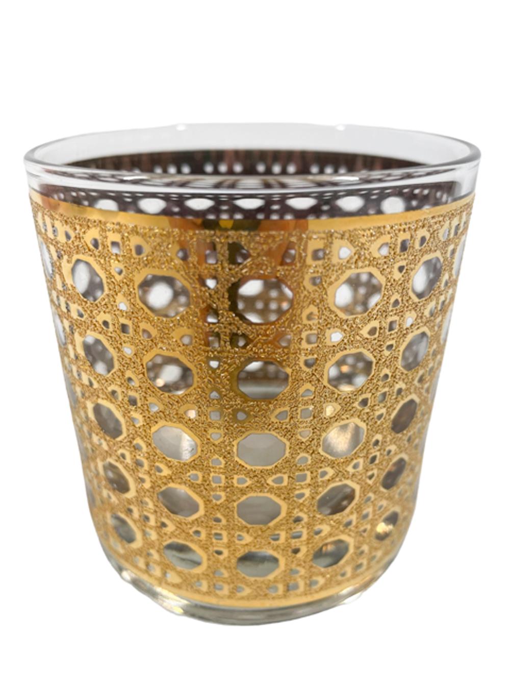 Four Mid-Century Modern rocks glasses by Culver, LTD with an allover woven cane pattern in 22 karat gold with a raised, textured surface.